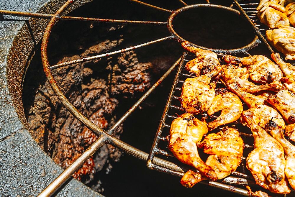 Tasty meat barbecued on volcanic heat, Timanfaya National Park, Canary Islands, Spain, Europe