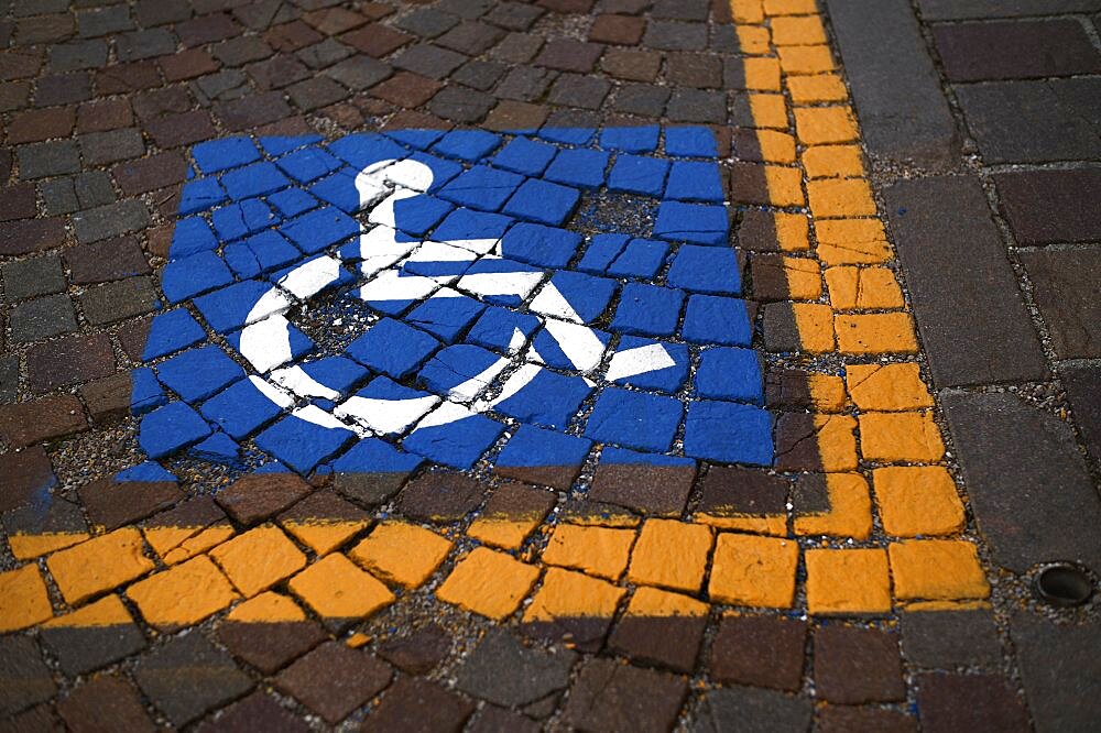 Reserved for wheelchair, severely disabled, marking on pavement, Ortisei, Val Gardena, South Tyrol, Italy, Europe