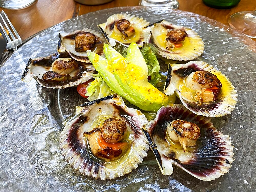 Seared scallops avocado, lettuce and toasted bread Mallorca Spain