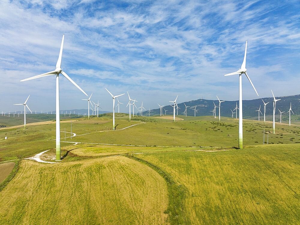 Windmills on a wind farm near Zahara de los Atunes, aerial view, drone shot, Cadiz province, Andalusia, Spain, Europe