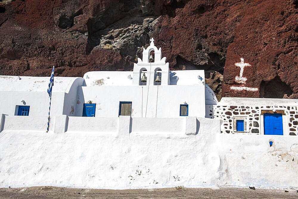 Little chapel Saint Nikolaos, on red beach, Santorini, Greece, Europe