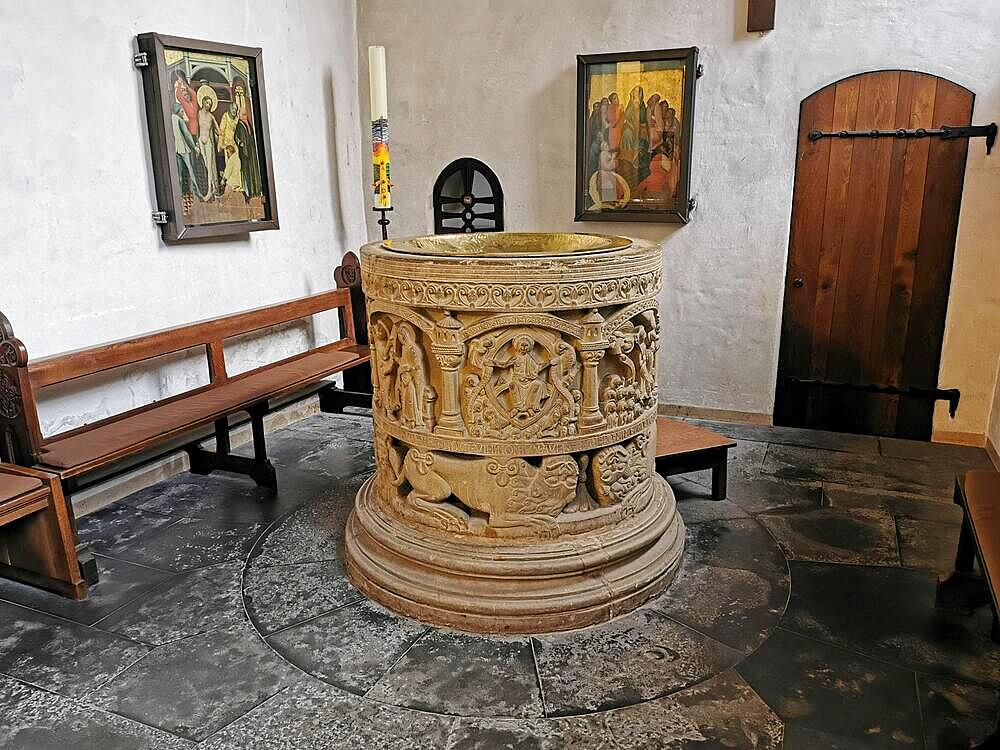 Romanesque baptismal font from 1129 in the former collegiate church of St. Boniface, Freckenhorst, Warendorf district, Baden-Wuerttemberg, Germany, Europe