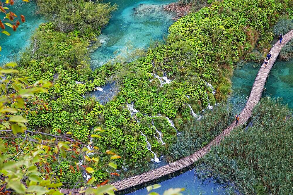 Plitvice Lakes National Park, tourists on wooden walkway, waterfalls between the lower lakes, UNESCO World Heritage Site, Croatia, Europe