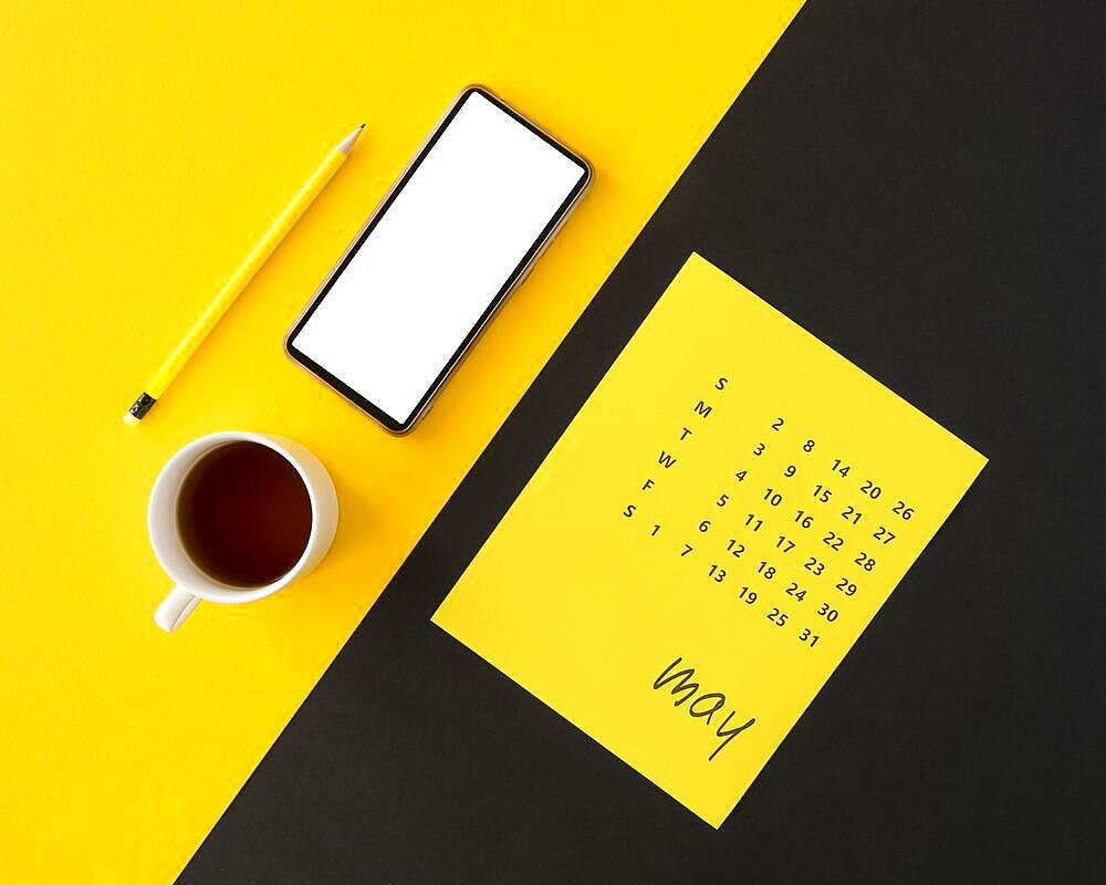 Planner calendar yellow black background with coffee