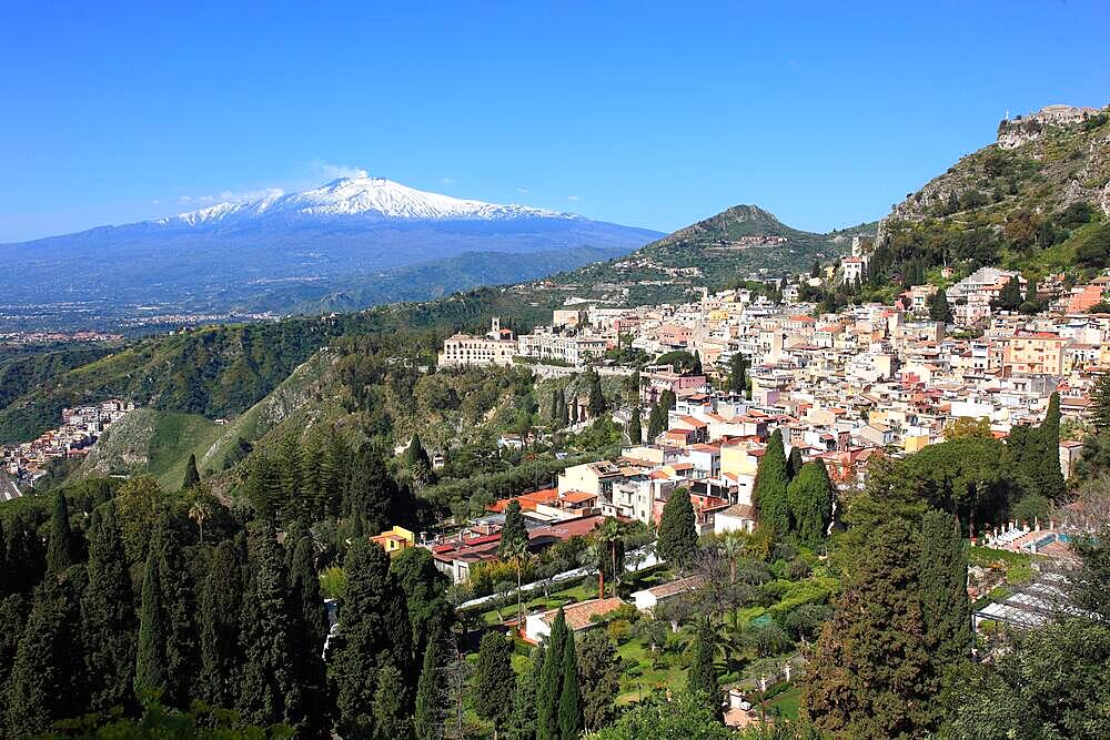 Taormina, view of the city and the volcano Etna from the ancient theatre, Etna, Sicily, Italy, Europe