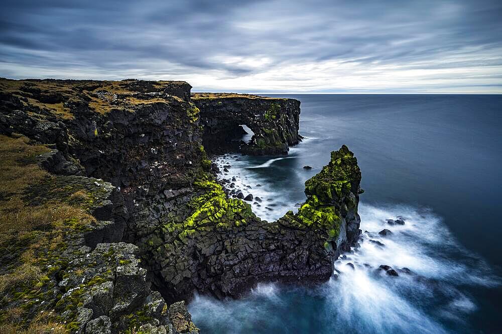 Cliff with rock formations near Oendverdarnes, long exposure, Oendveroarnes, Snaefellsjoekull National Park, Snaefellsnes Peninsula, Snaefellsnes, Vesturland, Iceland, Europe