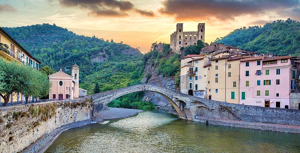 DOLCEACQUA, ITALY - CIRCA AUGUST 2020: Dolceacqua panorama with the ancient roman bridge made of stones and the castle