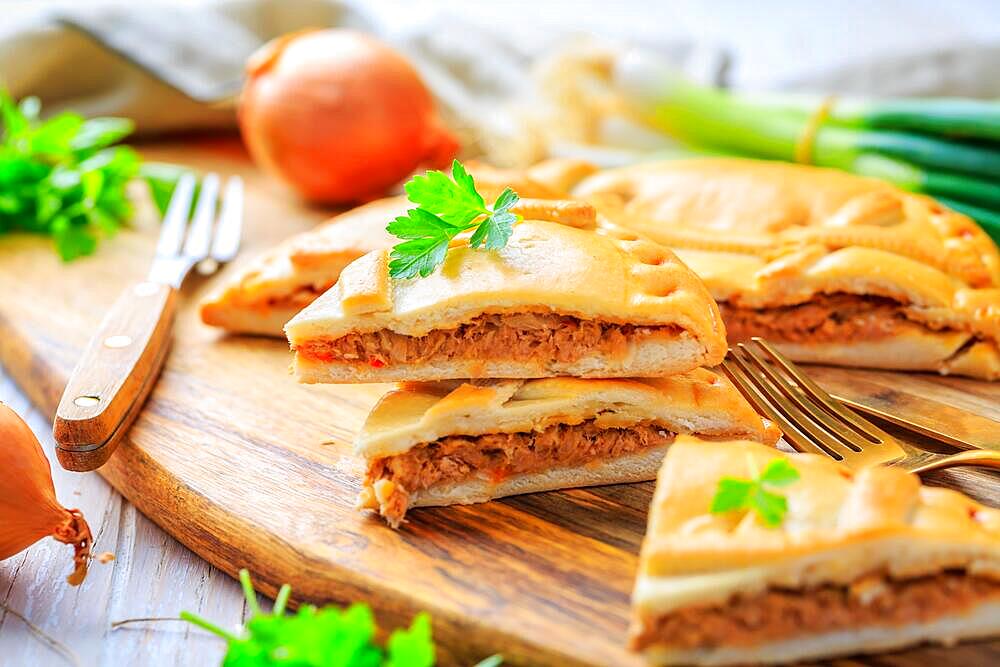 Empanada Gallega - traditional pie stuffed with tuna, Galician and Spanish cuisine. Tart with tuna and vegetables