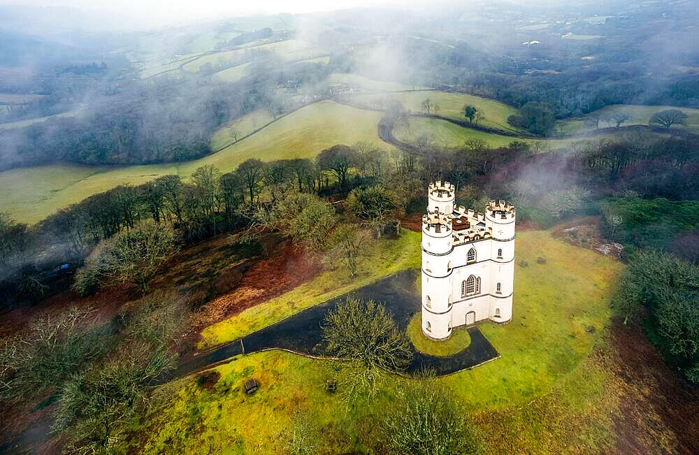 Misty morning over Haldon Belvedere from a drone, Lawrence Castle, Higher Ashton, Exeter, Devon, England, United Kingdom, Europe