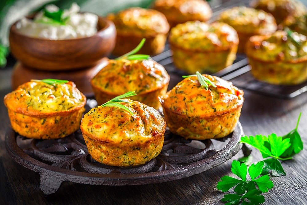 Homemade zucchini muffins with feta cheese, savory courgette with ingredients