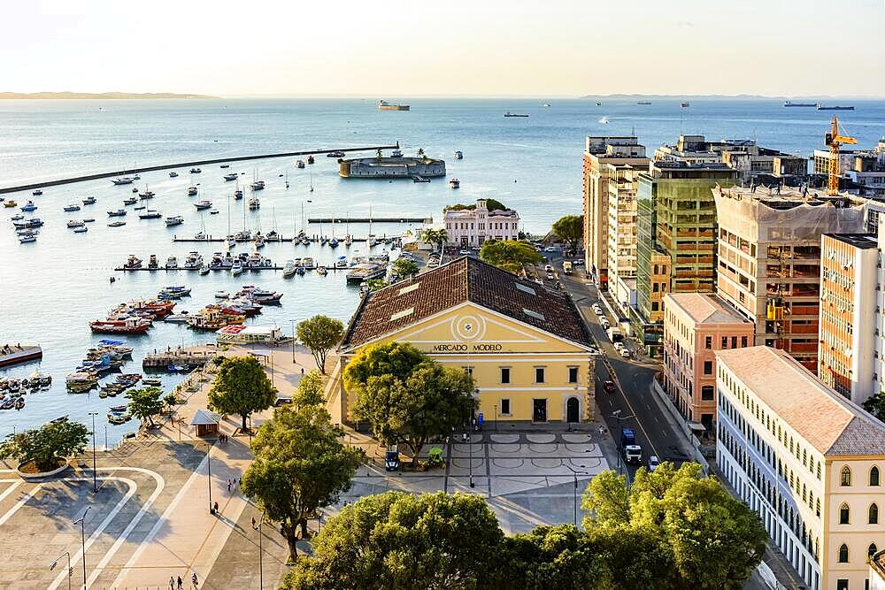 Top view of the famous Market Model, All Saints bay and harbour in the city of Salvador, Bahia at dusk, Brasil