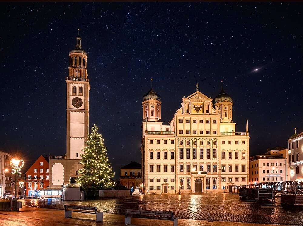 Illuminated christmas tree at the historic town square in Augsburg at night