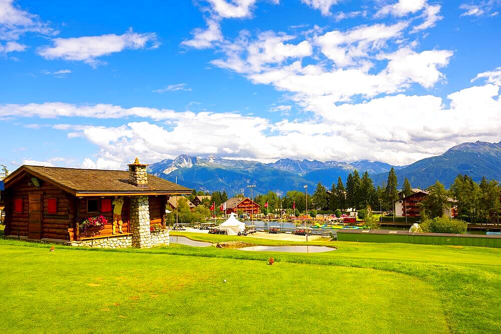 Crans Sur Sierre Golf Course and Water Park and Mountain View in Crans Montana in Valais, Switzerland, Europe