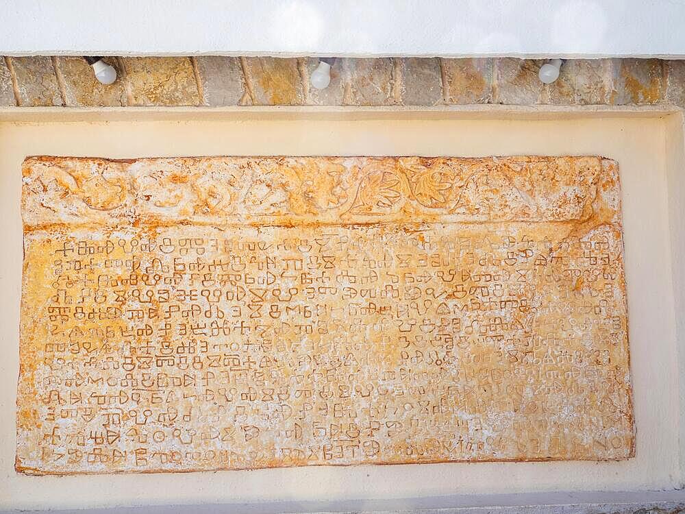 Stone tablet with old Croatian writing, fishing village Valun, Cres Island, Adriatic Sea, Kvarner Bay, Croatia, Europe