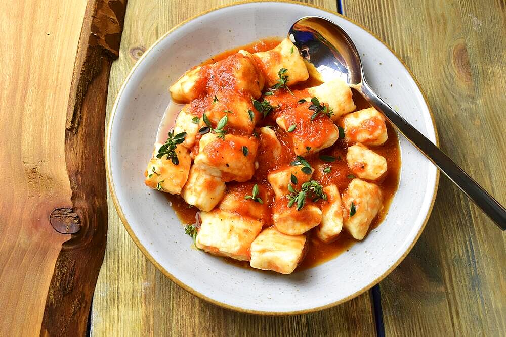 Gnocchi with tomato sauce and herbs