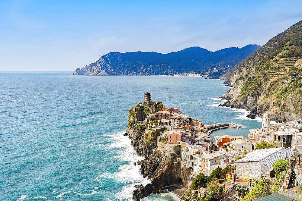 Scenic view of ocean and Vernazza village located in Cinque Terre, Italy, Europe