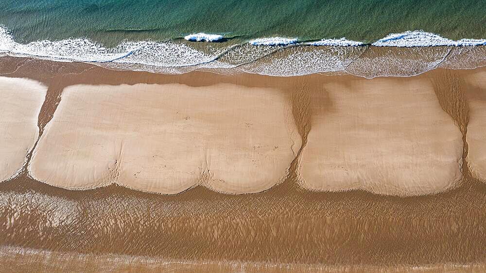 Whimsical formations on the sandy beach, Praia de porto mos, aerial view, Lagos, Algarve, Portugal, Europe