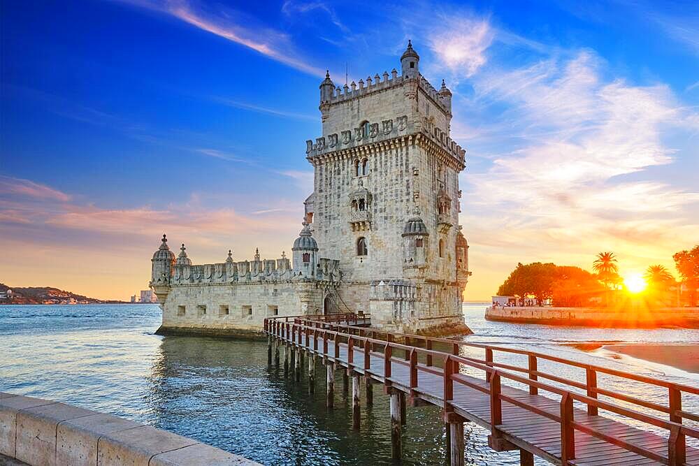 Belem Tower or Tower of St Vincent, famous tourist landmark of Lisboa and tourism attraction, on the bank of the Tagus River Tejo on sunset. Lisbon, Portugal, Europe