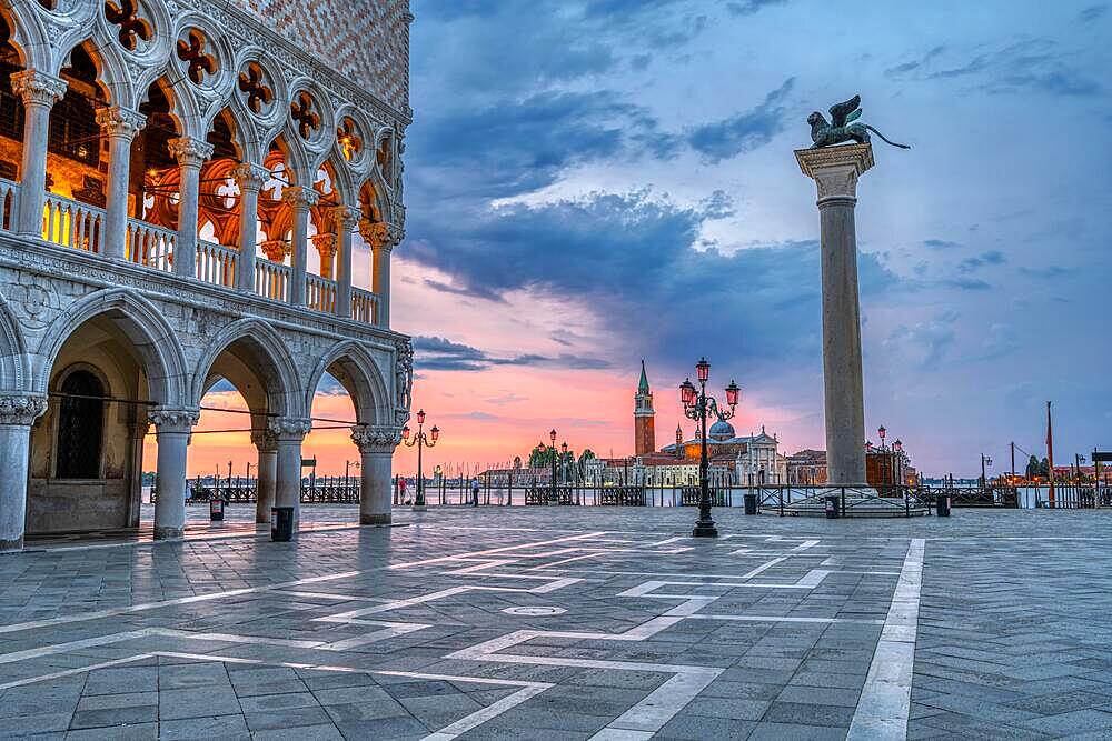 Dramatic sunrise at Piazzetta San Marco and Palazza Ducale in Venice, Italy, Europe