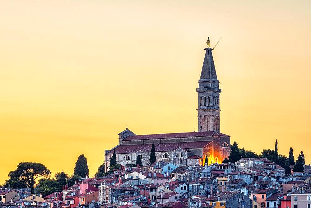 The old town of Rovinj in Croatia with the iconic Church of St Euphemia at sunset