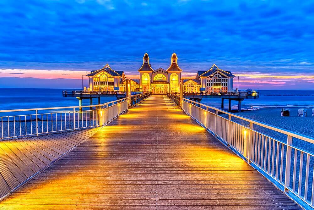 The beautiful pier in Sellin on the island of Ruegen in front of sunrise