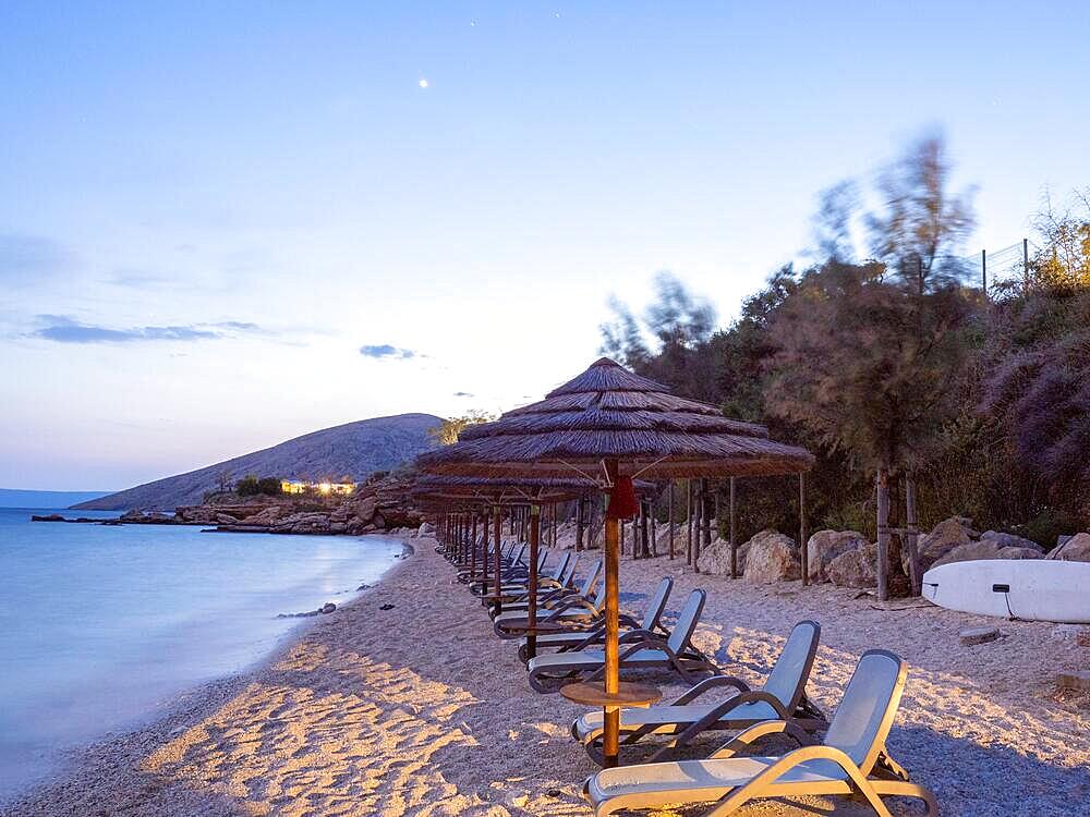 Sunshades and sunbeds on the sandy beach, campsite near Stara Baska, Island of Krk, Kvarner Gulf Bay, Croatia, Europe