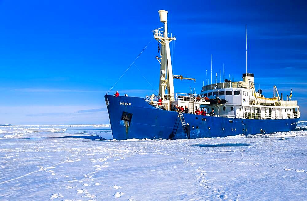 Ship with tourist at the ice edge in arctic, Svalbard, Norway, Europe