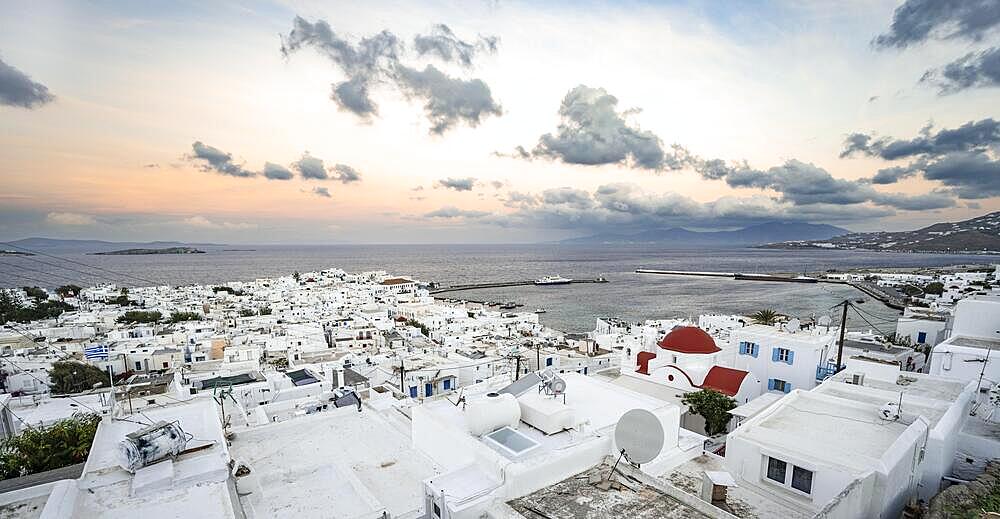 View over white Cycladic houses and harbour, at sunrise, panorama, island and sea, Mykonos Town, Mykonos, Cyclades, Greece, Europe