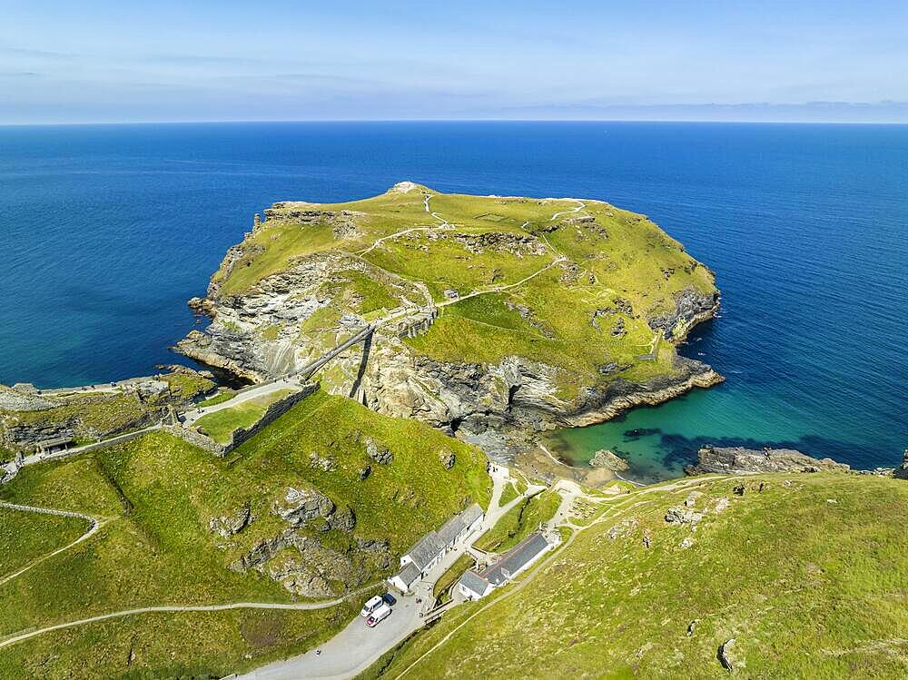 Aerial view of the rugged coastline on the Celtic Sea with the Tintagel Peninsula and the ruins of Tintagel Castle, North Cornwall, England, Great Britain