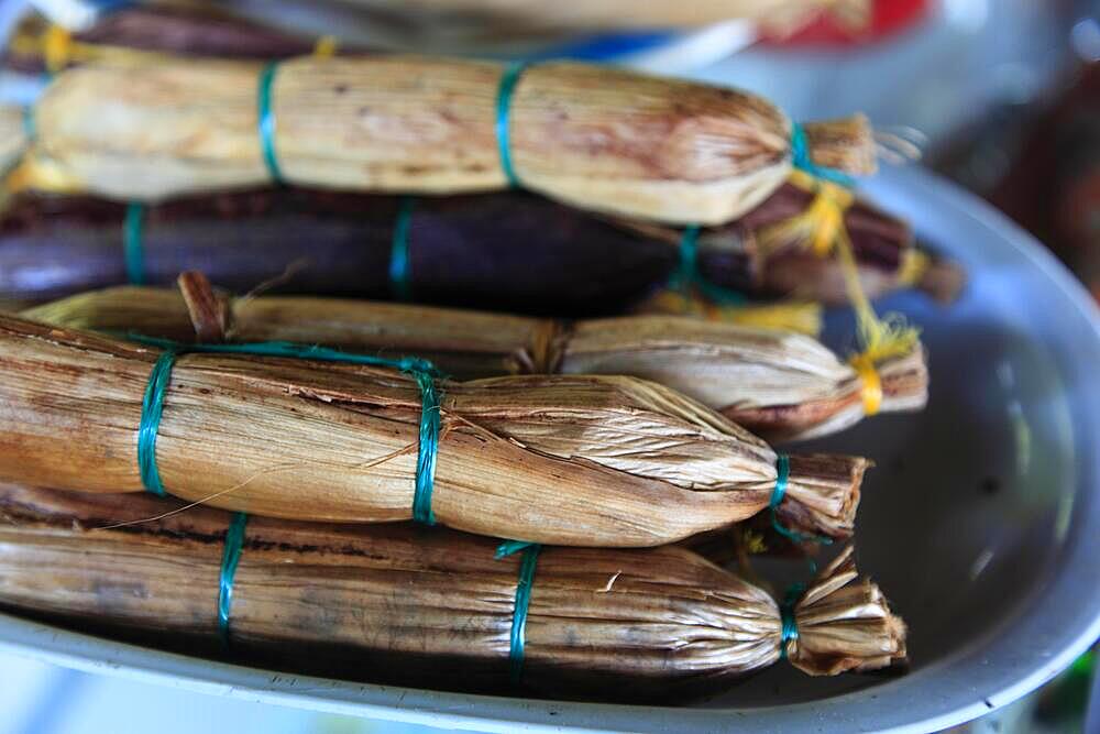 Colombian speciality, banana leaves stuffed with rice, coconut rice, grilled, Colombia, South America