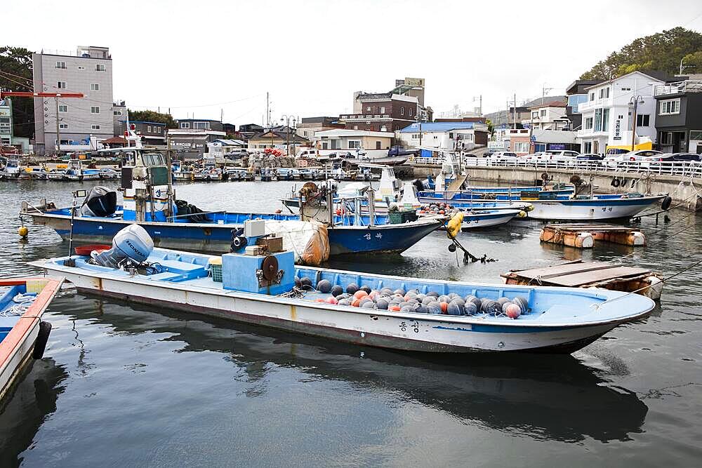 Boat in Gongsuhaean-gil harbour, Busan, South Korea, city by the sea, waterfront walk, coast, summer, sun, fishing boat, Asia