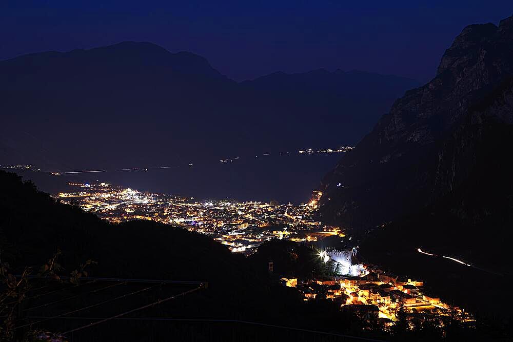 The town of Riva del Garde at night on Lake Garda in the municipality of Riva del Garda Trentino Northern Italy Europe