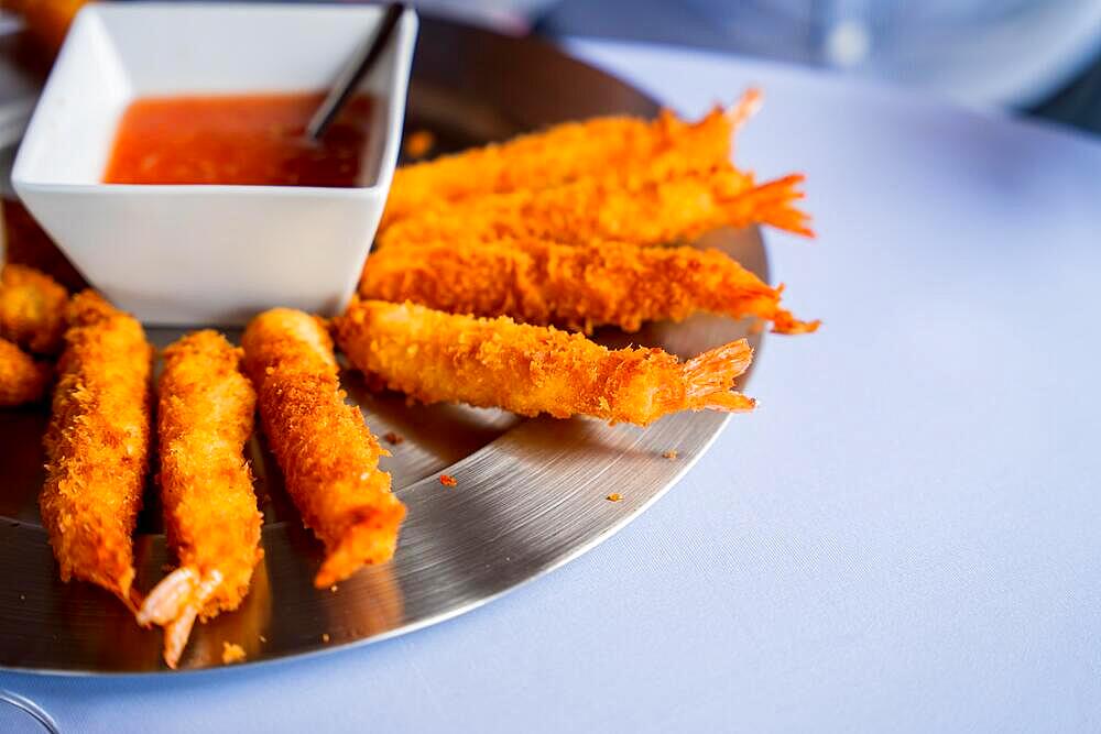 Shrimp or prawn battered with breadcrumb dough at an event at the buffet. Sandwich prawn for lunch