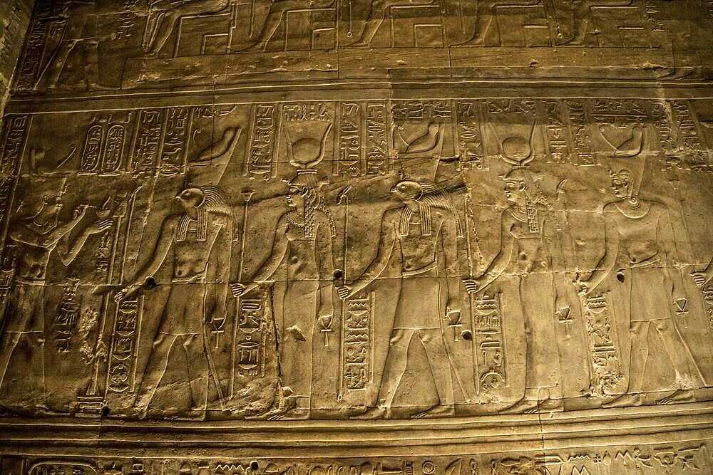 Hieroglyphic corridors of the Temple of Edfu in the city of Edfu, Egypt. On the bank of the Nile river, geco-Roman construction, temple dedicated to Huros