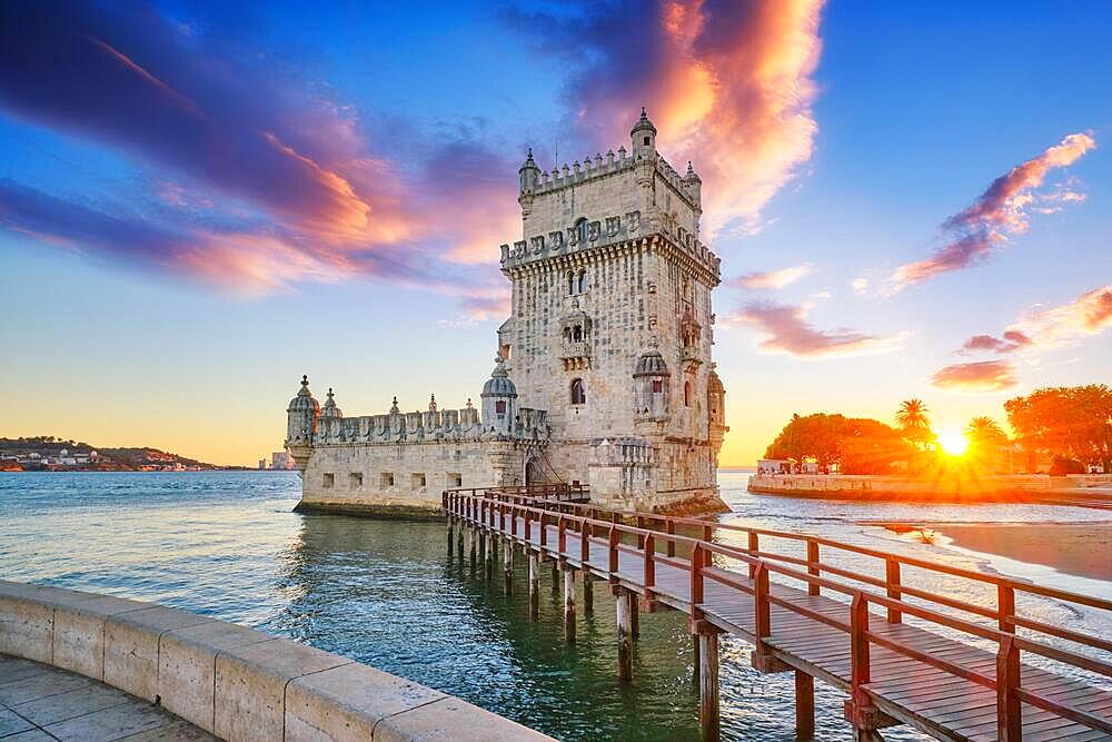 Belem Tower or Tower of St Vincent, famous tourist landmark of Lisboa and tourism attraction, on the bank of the Tagus River (Tejo) on sunset. Lisbon, Portugal, Europe