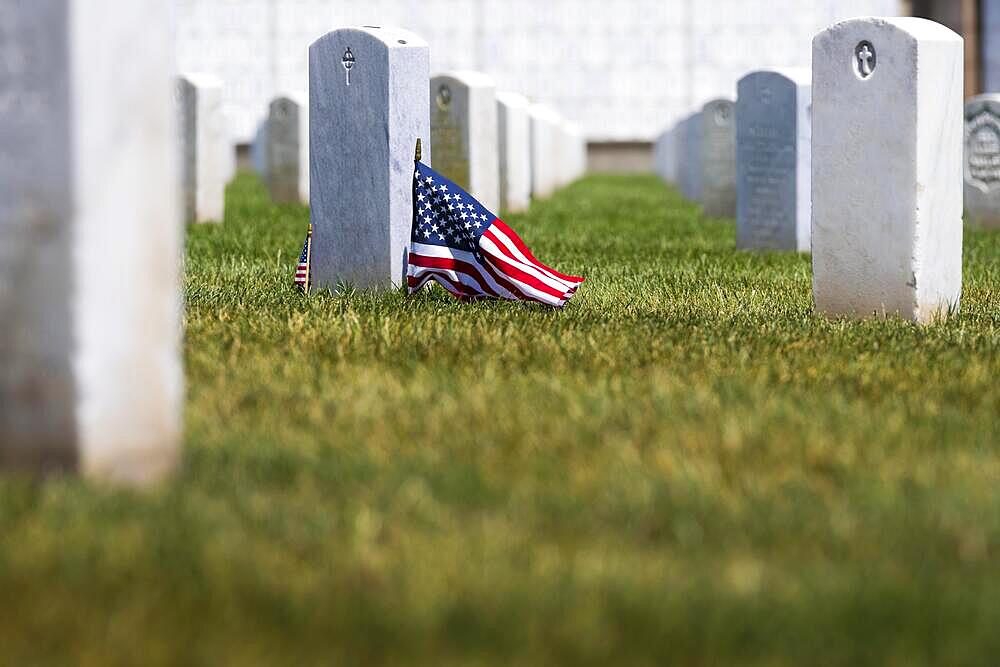 Generic view of a veterans cemetery on top of a hill showing American pride