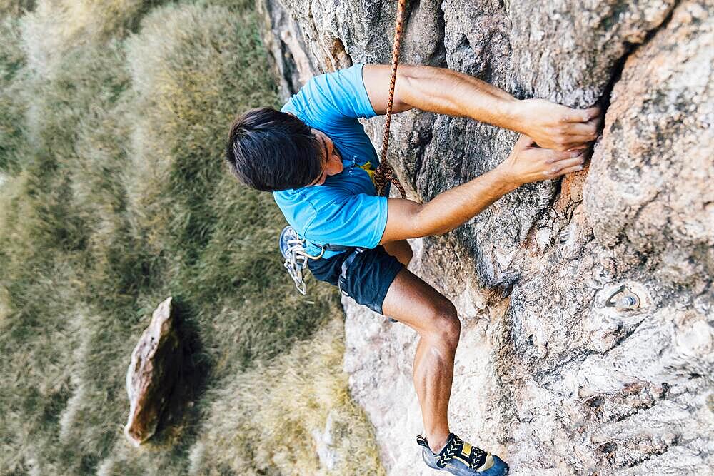 Rock climber steep wall