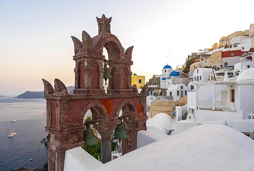 Old belfry wiith view of sea and caldera houses, Ia, Oia, Santorini, Greece, Europe