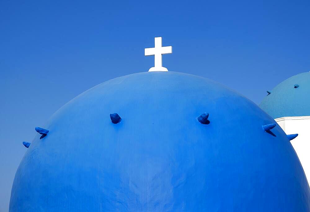 Close-up of blue dome with white cross, Agios Spiridonas, St Spyridon Church, Ia, Oia, Santorini, Greece, Europe