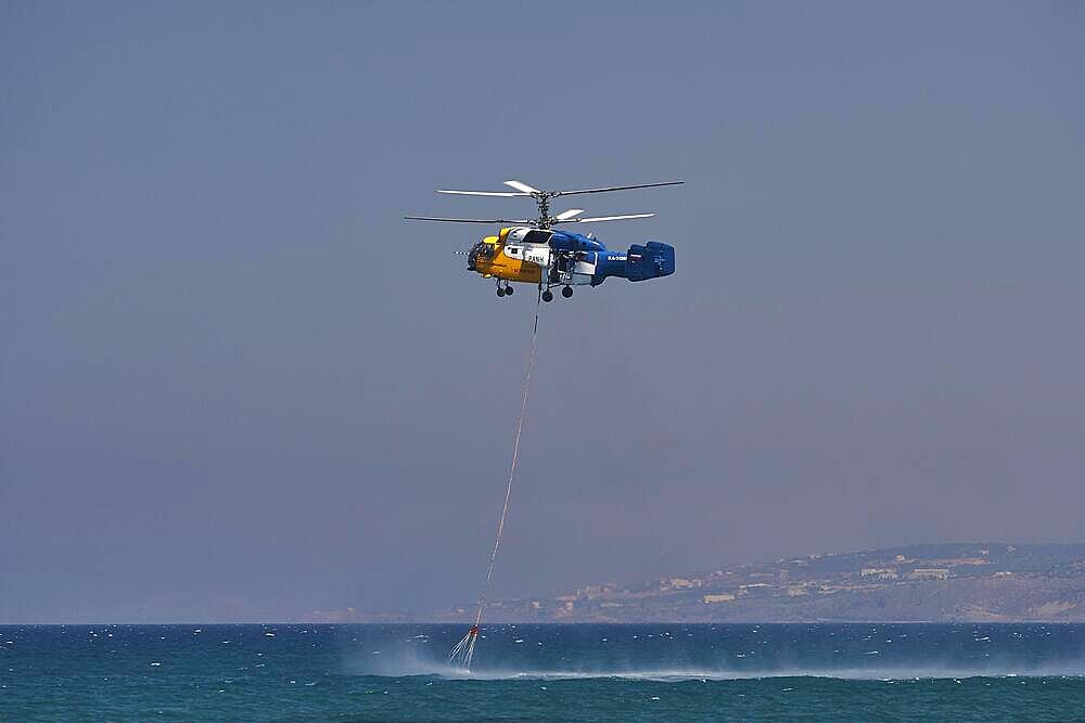 Helicopter, helicopter, fire-fighting helicopter, fire, helicopter refuelling water in sea, Georgioupolis, Crete, Greece, Europe