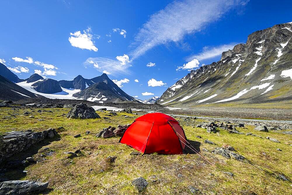 Red tent in Kaskasavagge valley, Kaskapakte glacier and mountains, mountain Kaskasatjakka and Kuopertjakka, river Gaskkasjohka, Kebnekaise massif, Lapland, Sweden, Europe