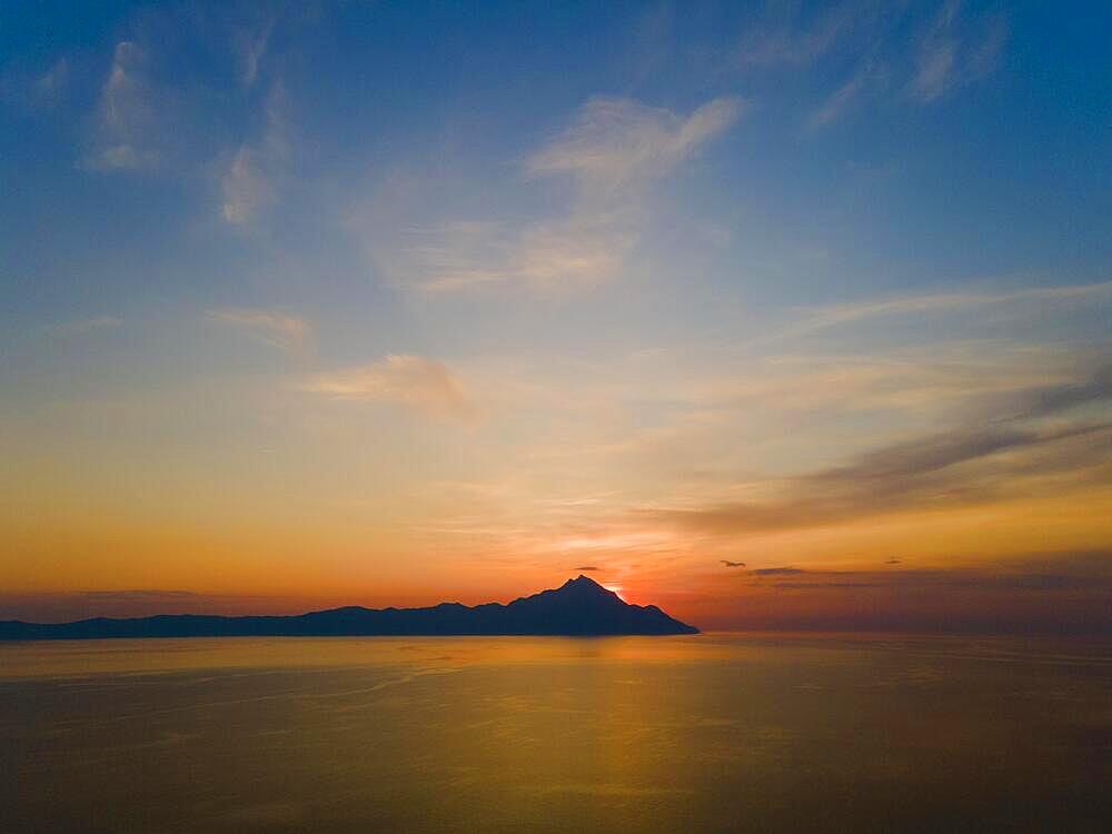 Aerial view, dawn, view of Mount Athos, Orthodox monastic republic with autonomous status under Greek sovereignty, taken from Kriaritsi, Sithonia, Chalkidiki, Central Macedonia, Greece, Europe