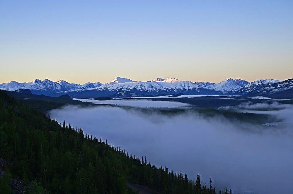 Fog over the Nenana River valley from Denali Village overlooking the Alaska Mountain Range, Alaska, USA, North America