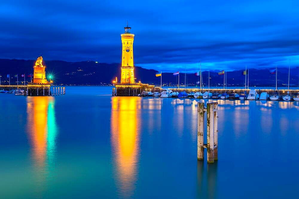 Lindau harbour to the Blue Stundnsee, New Lindau Lighthouse, Lion's Pier, Mangtower, clouds, boats, water, summer, Lindau, Bavaria, Germany, Europe