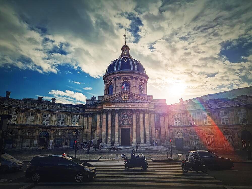 Bibliotheque Mazarine in Paris. Architectural facade details of the historical building which includes the Academy of Fine Arts and Institute of France. Old library outdoors view from Ponts des Arts