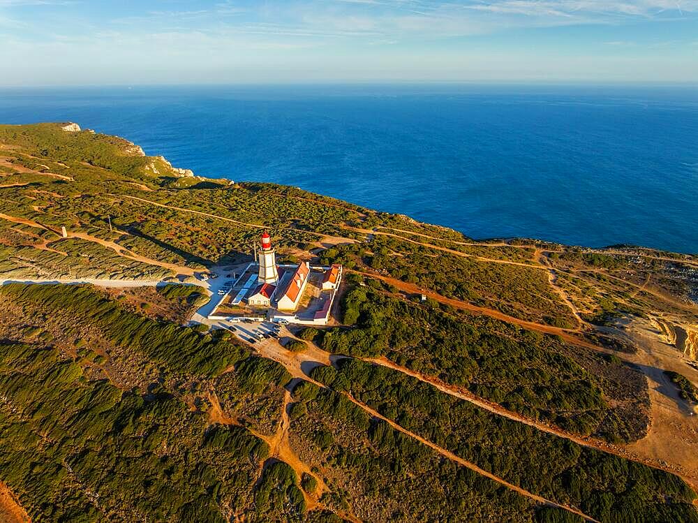 Aerial drone view of lighthouse on Cabo Espichel cape Espichel on Atlantic ocean