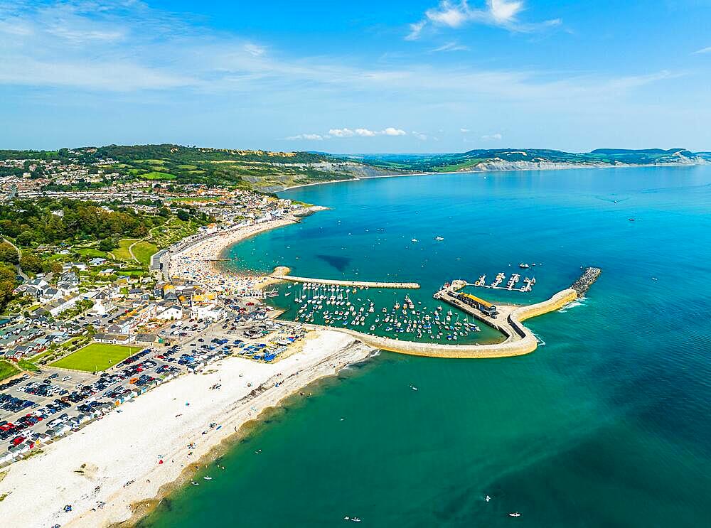 Marina and Beach in Lyme Regis from a drone, Jurassic Coast, Dorset, England, United Kingdom, Europe