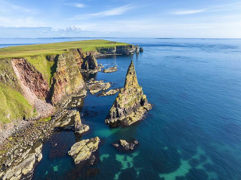 Aerial view of the rugged coastal landscape with the Duncansby Stacks, Duncansby Head coast, County Caithness, Scotland, United Kingdom, Europe