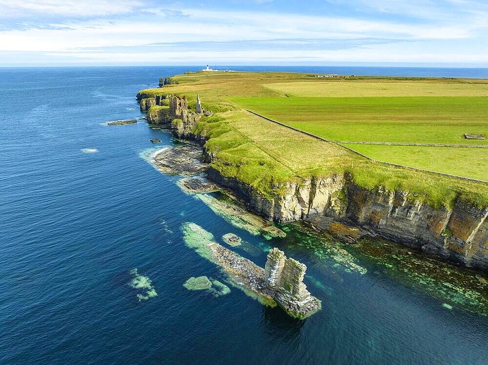 Rugged rocky landscape on the North Sea coast with the ruins of Girnigoe and Sinclair Castle, Wick, County Caithness, Scotland, United Kingdom, Europe