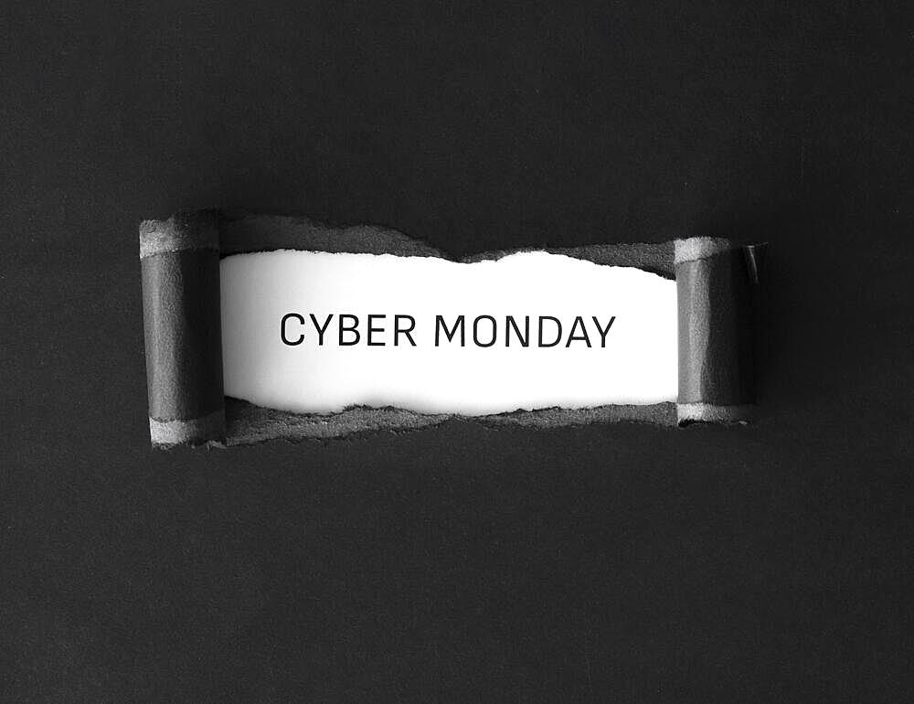 Flat lay cyber monday with ripped paper